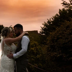 wedding kiss at pinchinthorpe hall in North Yorkshire
