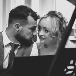 bride & groom in love at piano